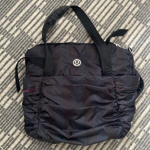 Lululemon Triumphant Black Ruffled Gym Bag